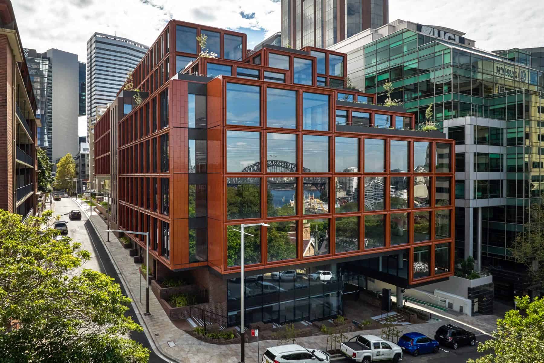 A contemporary office building with glass windows and steel design, ideal for new business ventures.